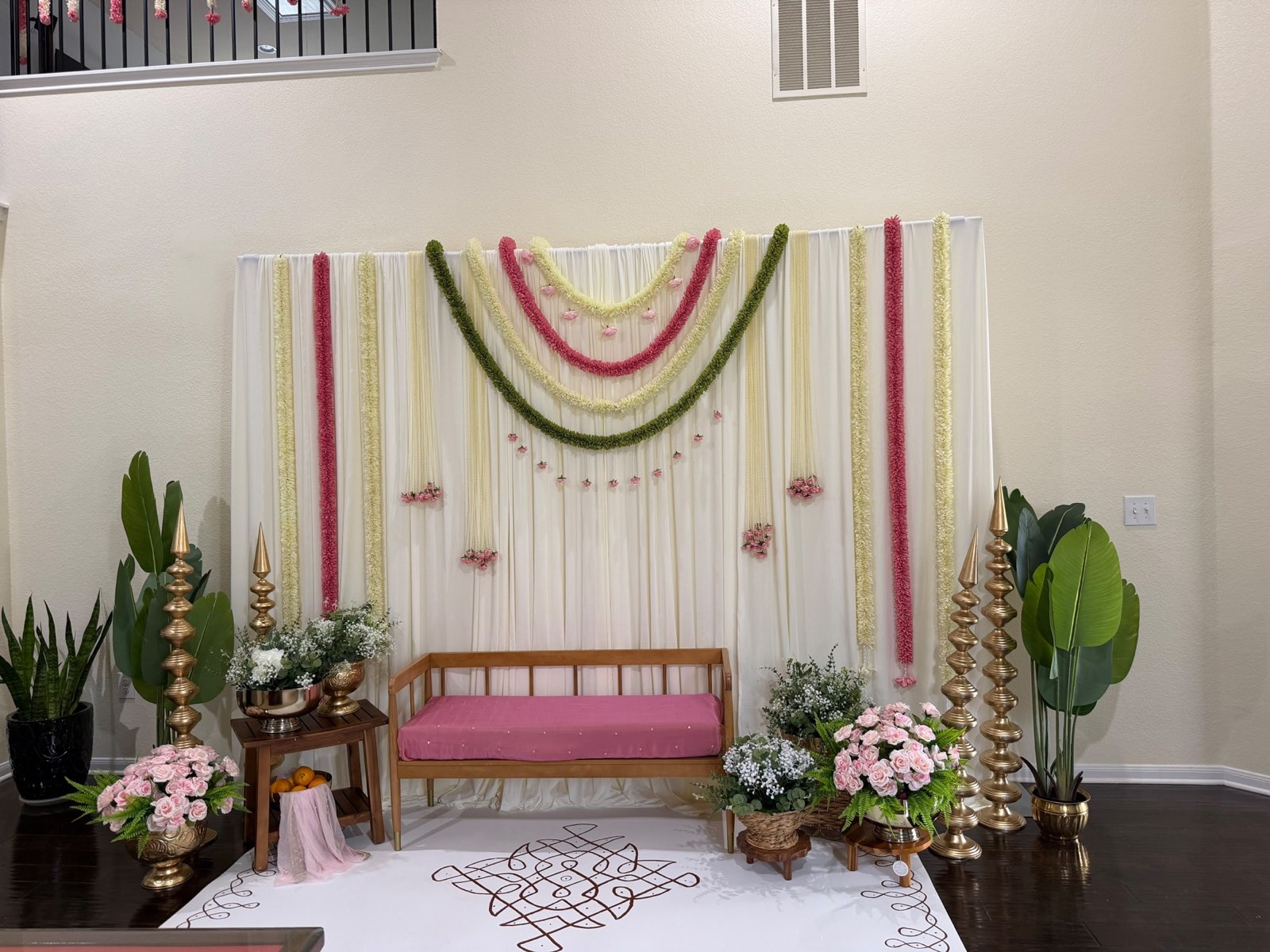 Home Ceremony Backdrop with Garlands and Kolam